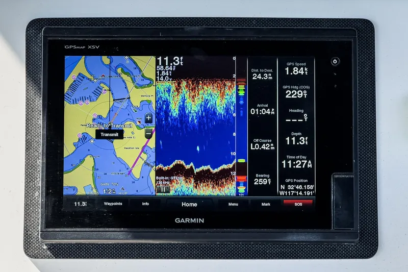 Slide: The Image of Garmin GPS display on 2006 Riviera 33 Flybridge, showing navigation and sonar data. - 16