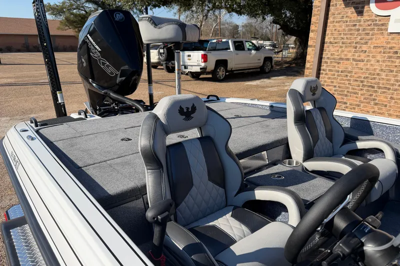 Slide: The Image of 2026 Phoenix 921 Elite X II boat with luxury seating and powerful engine. - 7