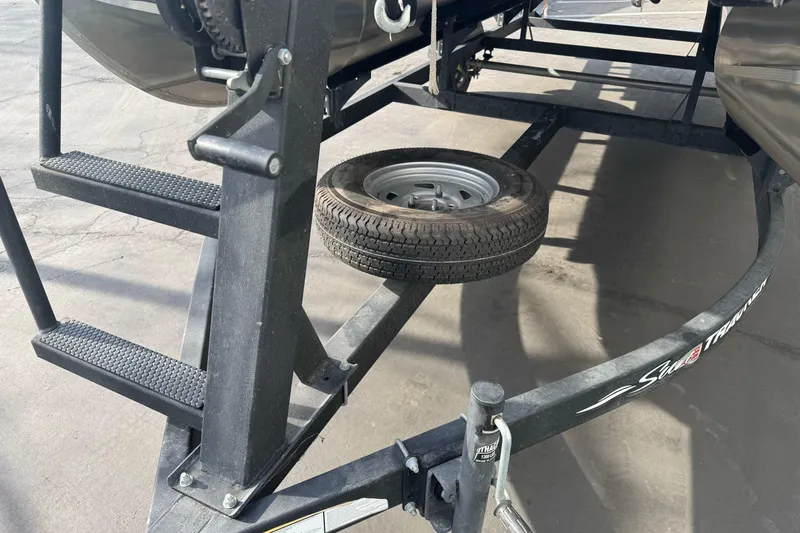 Slide: The Image of Trailer of 2024 Sun Tracker Party Barge 16 DLX with spare tire and ladder. - 7