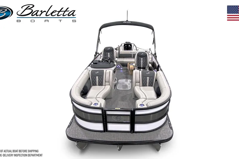 Slide: The Image of 2026 Barletta Lusso 23UC pontoon boat docked at a marina under clear blue skies. - 14