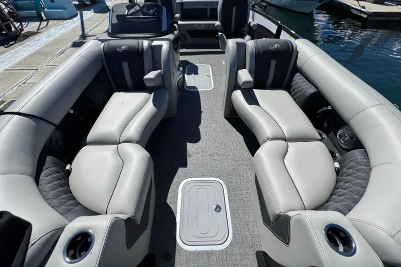 Slide: The Image of 2026 Barletta Lusso 23UC pontoon boat interior with luxurious seating and modern design. - 17