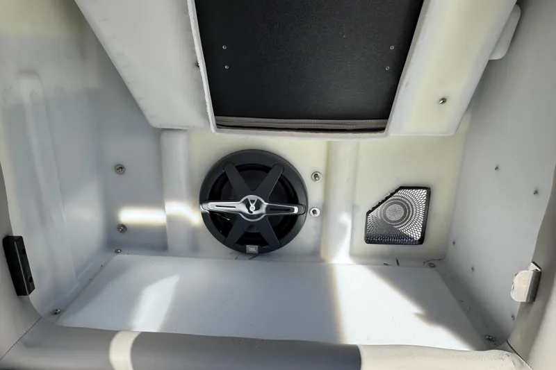 Slide: The Image of Interior view of 2026 Barletta Lusso 23UC boat compartment with speaker and vent. - 35