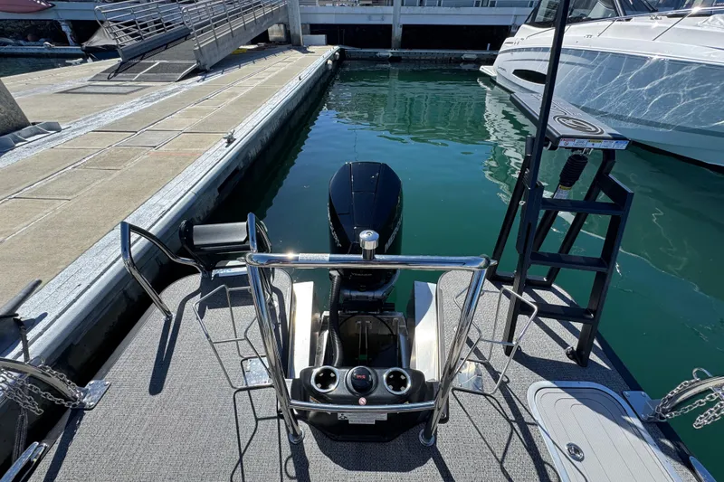 Slide: The Image of 2026 Barletta Lusso 23UC pontoon boat docked, featuring sleek design and modern amenities. - 59