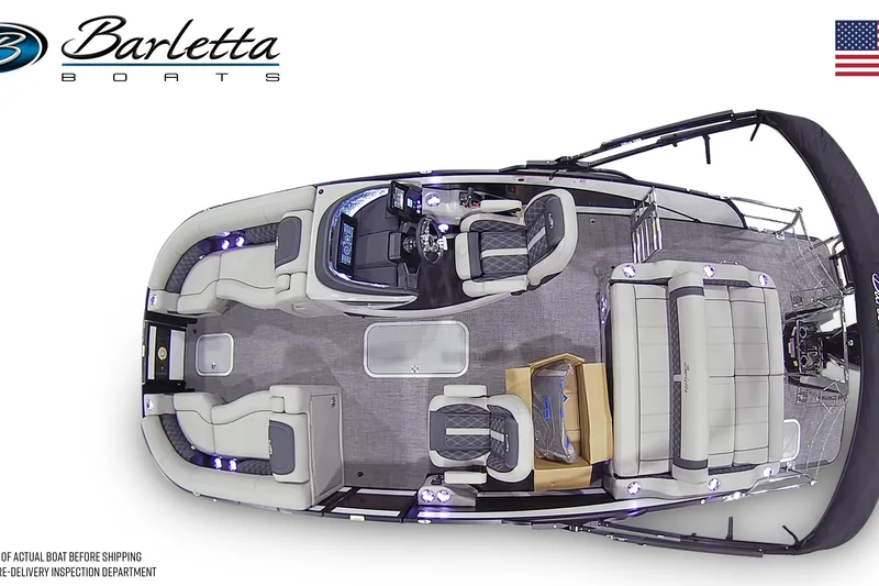 Slide: The Image of 2026 Barletta Lusso 23UC pontoon boat docked in a marina under clear blue skies. - 7