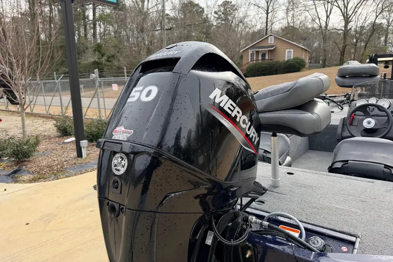Slide: The Image of 2022 Bass Tracker Pro 170 boat with Mercury 50 engine, parked outdoors. - 7