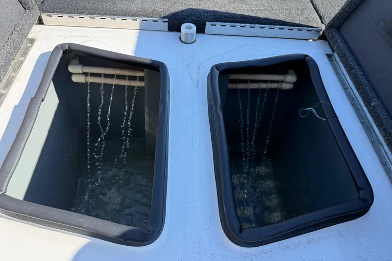 Slide: The Image of Livewell compartments in a 2005 Bass Cat Pantera Classic boat, with water aeration system. - 12