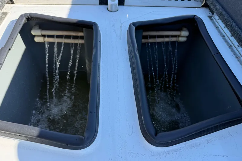Slide: The Image of Livewell system in a 2005 Bass Cat Pantera Classic boat, water flowing inside. - 15