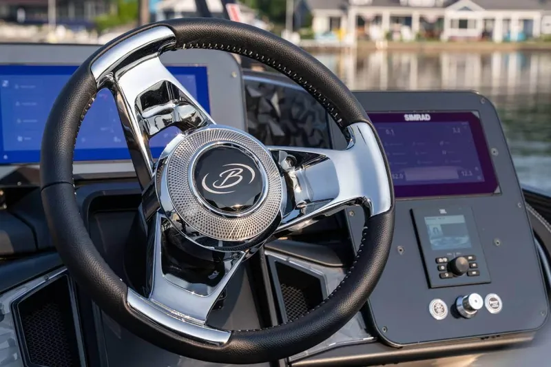 Slide: The Image of Manufacturer Provided Image: Steering wheel and dashboard of 2026 Barletta Lusso 23M boat, featuring modern controls. - 10
