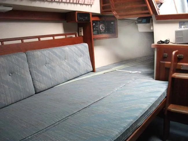 Slide: The Image of Interior of a 1990 Catalina 27 yacht with sleeping area. - 10