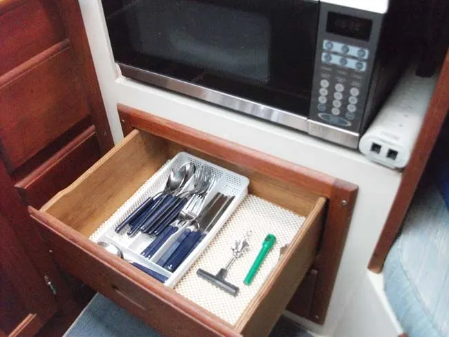 Slide: The Image of Kitchen drawer with cutlery in Catalina 27 boat, year 1990. - 16