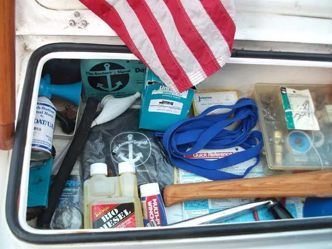 Slide: The Image of Toolbox on Catalina 27 sailboat, 1990 model, with flag and accessories. - 36