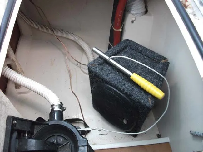 Slide: The Image of Interior of a 1990 Catalina 27 with technical components. - 38