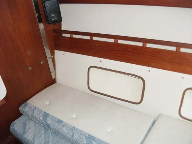 Slide: The Image of Interior of a 1990 Catalina 27 yacht with wood finish. - 41