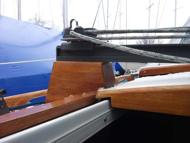 Slide: The Image of Close-up of a 1990 Catalina 27 sailboat with wooden details. - 42