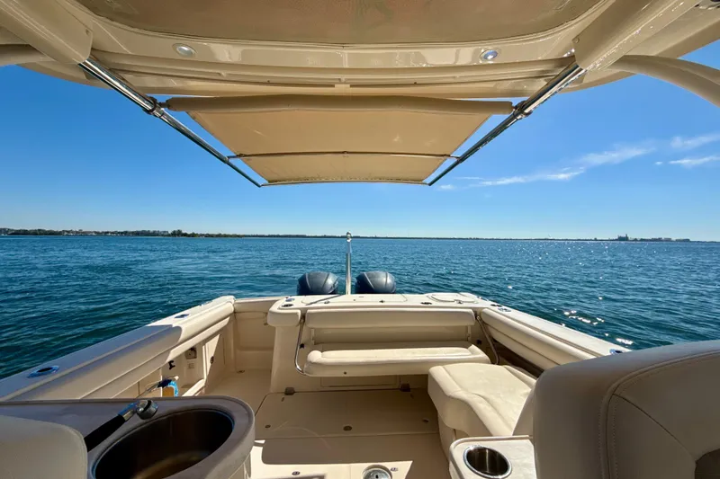 Slide: The Image of 2016 Grady-White Freedom 307 boat interior with spacious seating on open water. - 25