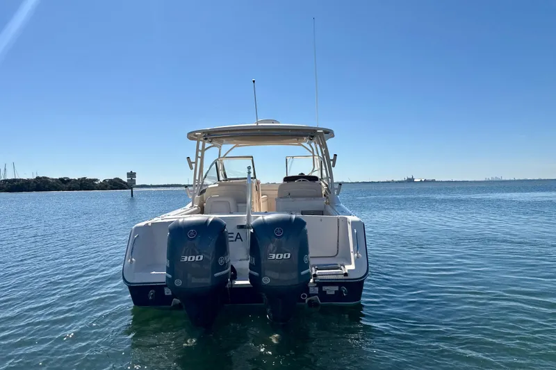 Slide: The Image of 2016 Grady-White Freedom 307 boat bathroom with sink, toilet, and wooden floor. - 27
