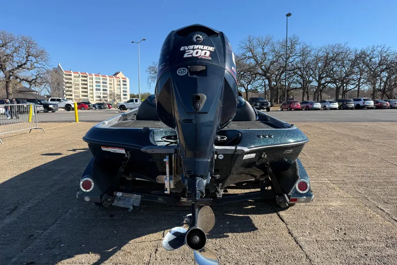 Slide: The Image of 2008 Ranger 198 VX boat with Evinrude 200 engine in parking lot. - 14