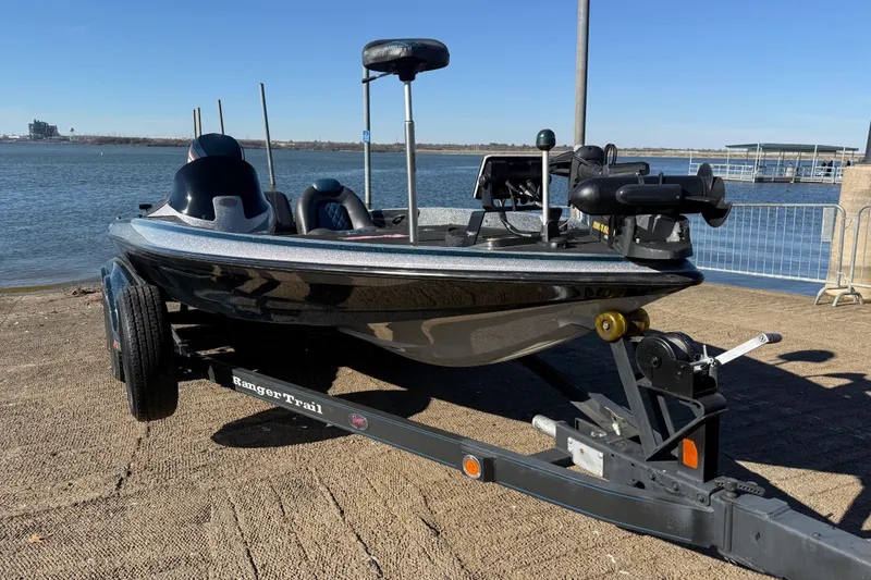 Slide: The Image of 2008 Ranger 198 VX boat on trailer by the water, ready for launch. - 28