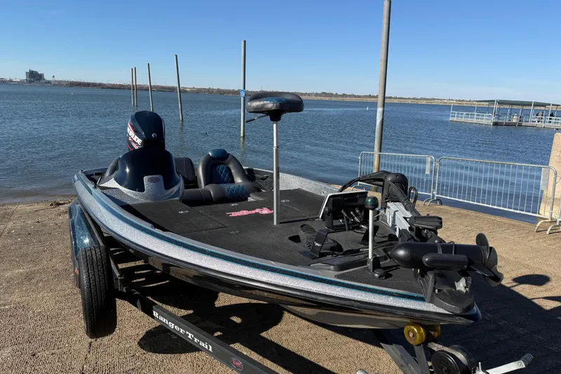 Slide: The Image of 2008 Ranger 198 VX boat on trailer by a lake, ready for launch. - 29