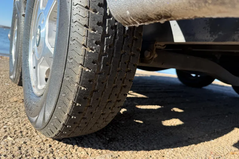 Slide: The Image of Close-up of 2008 Ranger 198 VX tire on a textured surface. - 34