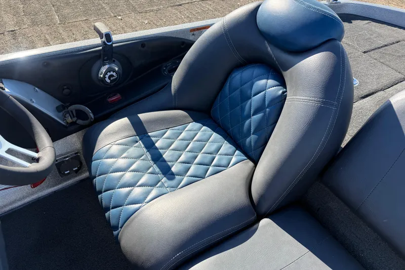 Slide: The Image of 2008 Ranger 198 VX boat seat with quilted blue and black leather design. - 53
