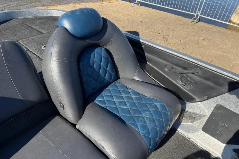 Slide: The Image of 2008 Ranger 198 VX boat seat with blue and gray quilted design. - 56