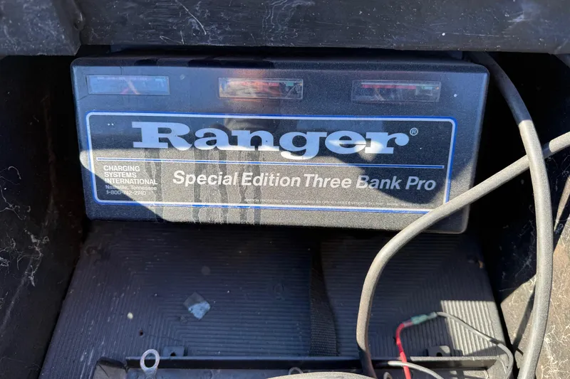 Slide: The Image of 2008 Ranger 198 VX Special Edition Three Bank Pro charger in a boat compartment. - 64