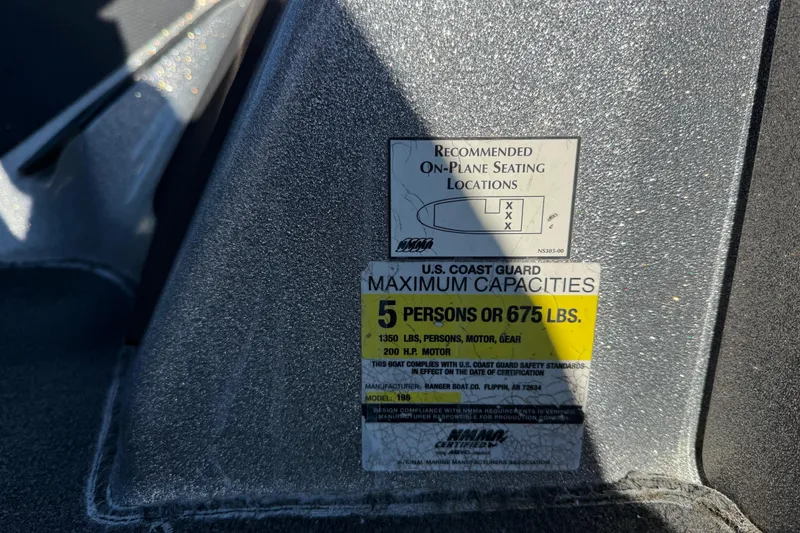 Slide: The Image of 2008 Ranger 198 VX capacity label, seating for 5 or 675 lbs, U.S. Coast Guard certified. - 65