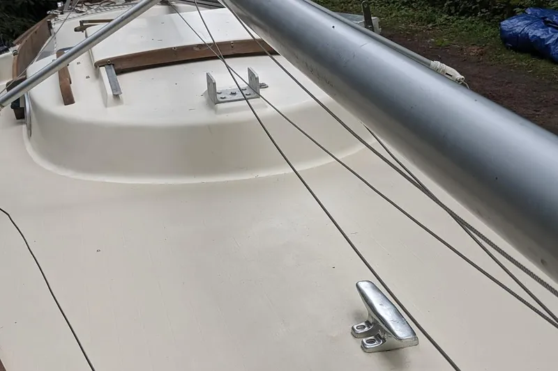 Slide: The Image of 1981 McVay Bluenose sailboat deck with rigging and fittings. - 12