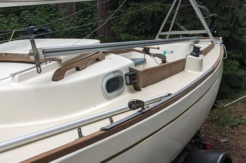 Slide: The Image of 1981 McVay Bluenose sailboat on trailer, featuring wooden trim and winch. - 15