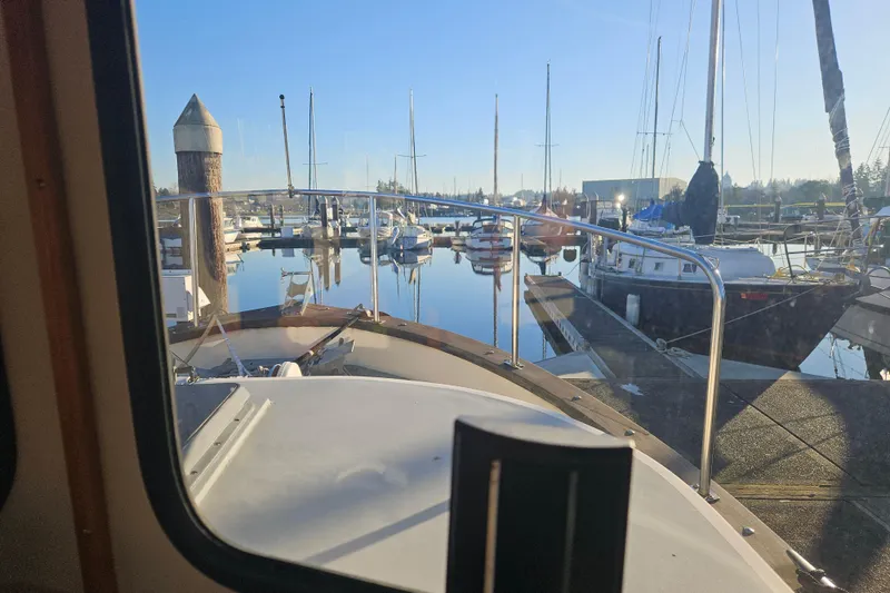 Slide: The Image of Control panel of a 1981 Nordic Tug Cricket with navigation and lighting systems. - 20