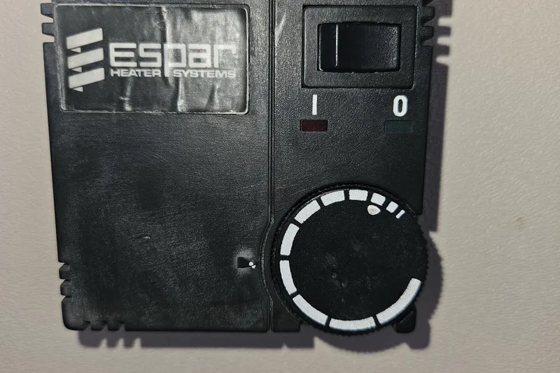 Slide: The Image of Porthole view from 1981 Nordic Tug Cricket, showcasing exterior boat details. - 38