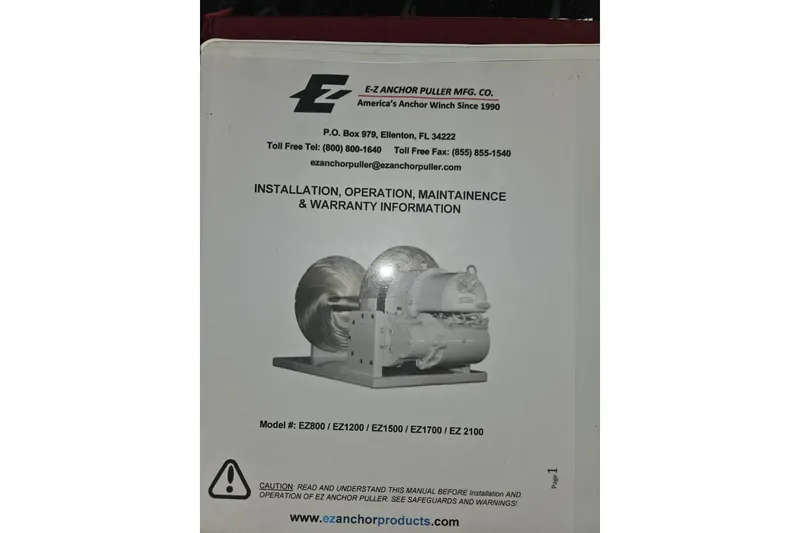 Slide: The Image of Engine room components of a 1981 Nordic Tug Cricket boat, featuring hoses and fittings. - 62