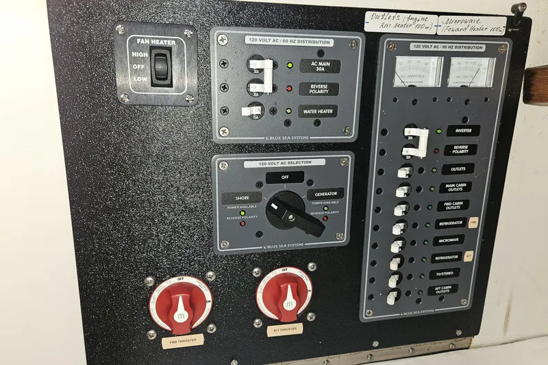 Slide: The Image of 1981 Nordic Tug Cricket boat with life preserver, docked in marina under clear sky. - 7