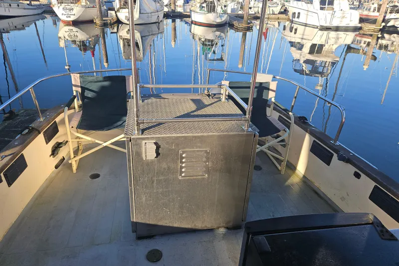 Slide: The Image of 1981 Nordic Tug Cricket interior with metal fixtures and outdoor view. - 11