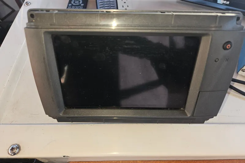 Slide: The Image of Ventilation grille on 1981 Nordic Tug Cricket, featuring a metal mesh design. - 43