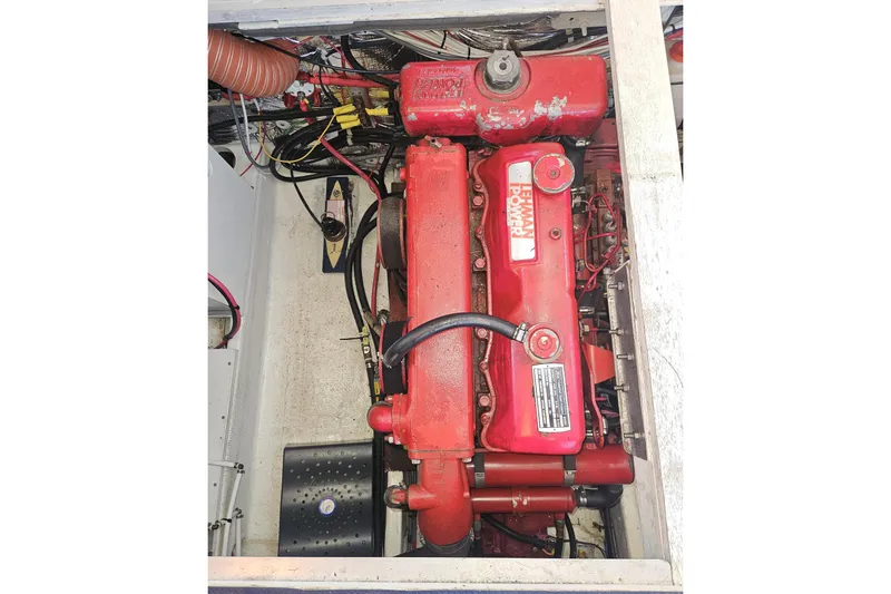 Slide: The Image of Control panel of a 1981 Nordic Tug Cricket featuring EZ1500 anchor controls and Dometic tank status. - 53
