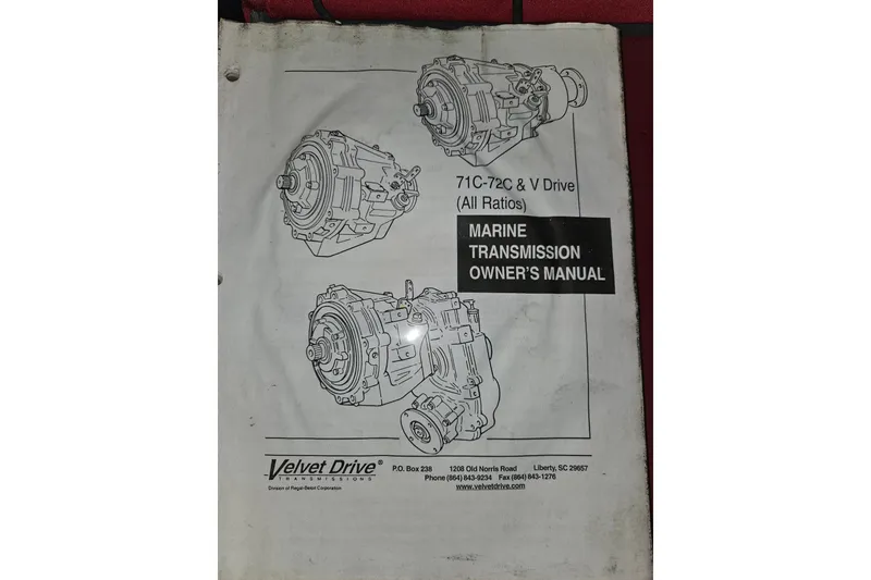 Slide: The Image of Engine of a 1981 Nordic Tug Cricket, featuring red components and visible wiring. - 57