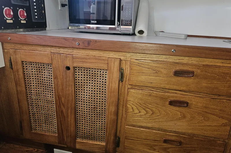 Slide: The Image of 1981 Nordic Tug Cricket boat docked, named "AlliGator III," Eugene, OR. - 6