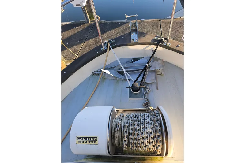 Slide: The Image of Engine room of 1981 Nordic Tug Cricket with fuel filters and electrical outlet. - 61