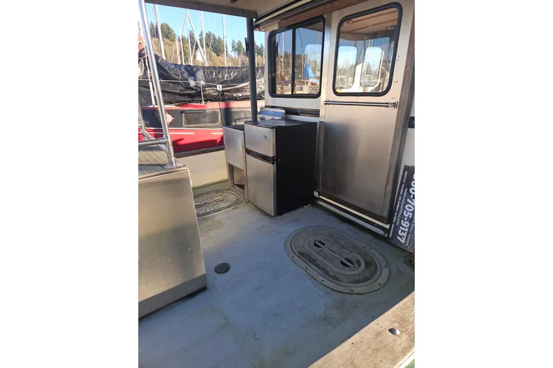 Slide: The Image of Electrical control panel on a 1981 Nordic Tug Cricket boat, featuring switches and dials. - 9