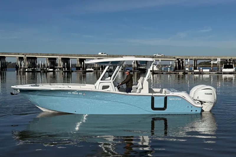 The Image of 2024 Sea Fox 288 Commander boat on calm water, featuring Yamaha engines. - 0