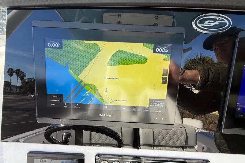 Slide: The Image of Garmin navigation display on 2024 Sea Fox 288 Commander boat dashboard. - 12
