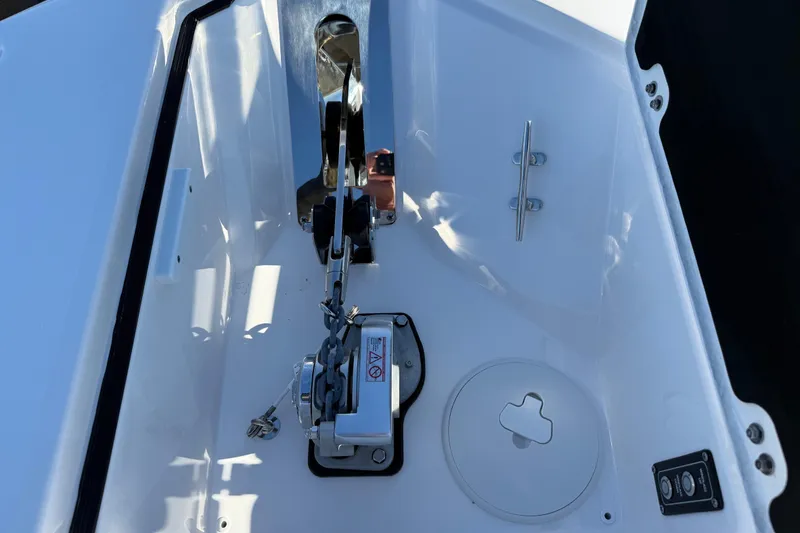 Slide: The Image of 2024 Sea Fox 288 Commander anchor compartment with chain and cleat. - 43