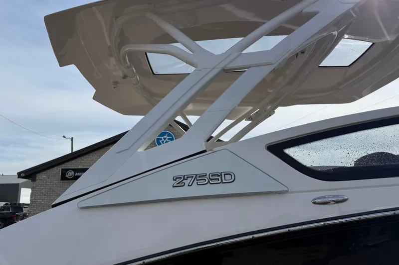 Slide: The Image of 2024 Yamaha 275SDX boat, sleek design with modern features, close-up view. - 4