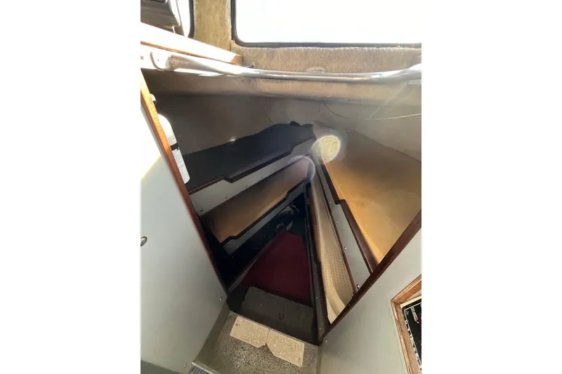 Slide: The Image of Interior view of 1992 Munson 38’ Aluminum Commercial Dive boat, featuring compact cabin space. - 4