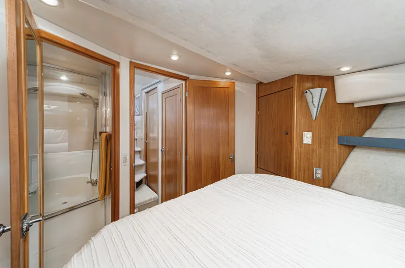 Slide: The Image of Interior of 1998 Bayliner 3988 Motoryacht with wood paneling and modern amenities. - 20