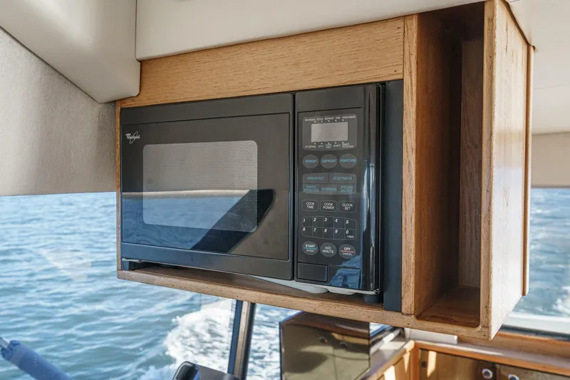Slide: The Image of Microwave in 1998 Bayliner 3988 Motoryacht kitchen, with ocean view. - 32
