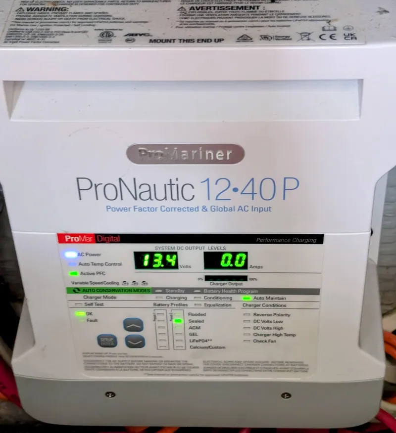Slide: The Image of ProMariner ProNautic 12-40P marine battery charger displaying 13.4 volts, suitable for 1999 Silverton 351 Sedan Cruiser. - 20
