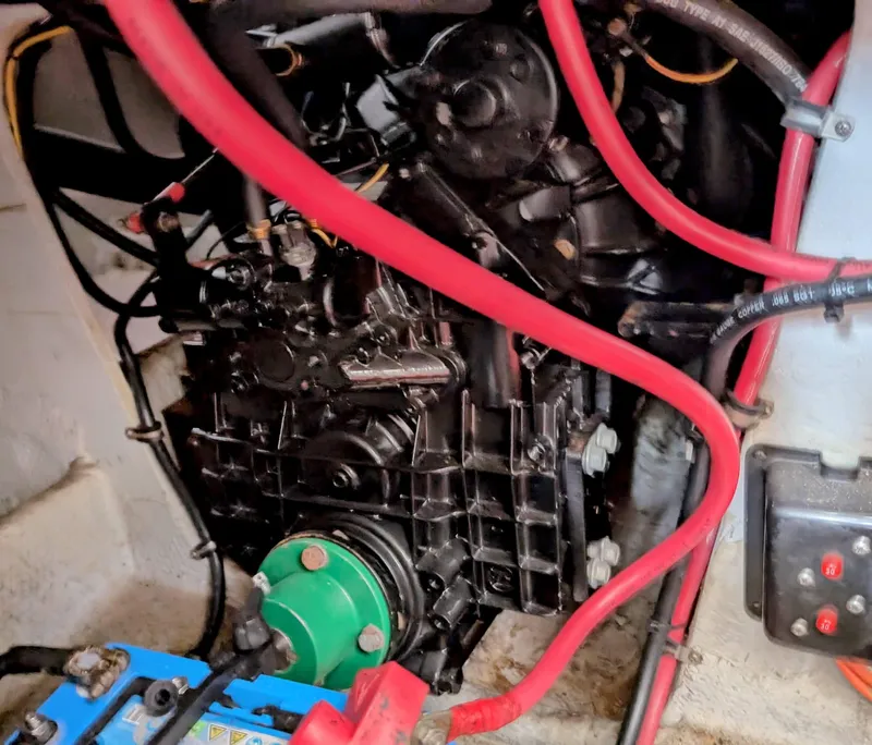 Slide: The Image of Engine compartment of a 1999 Silverton 351 Sedan Cruiser with visible wiring and components. - 22